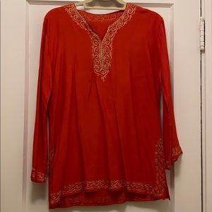 Beautiful red top with gold thread trim